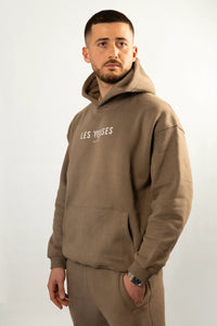 Oracle Hoodie in Desert Clay — Hood Up Pose