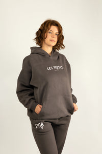 Oracle Hoodie in Midnight Dust — Female Model Standing