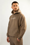 Oracle Hoodie in Desert Clay — Hood Up Pose
